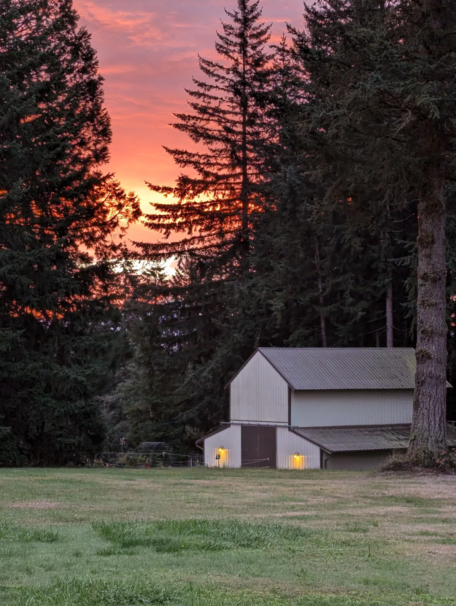 Farm barn at sunset